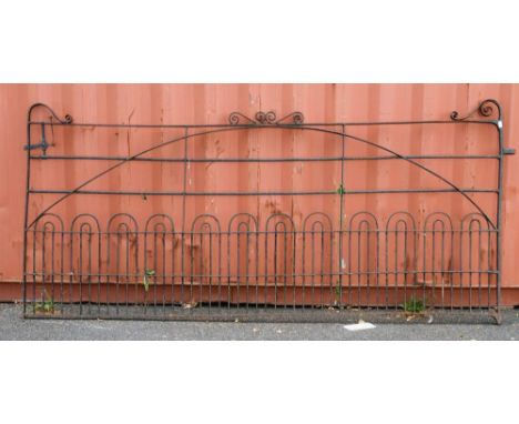 A Victorian wrought iron estate gate, last quarter 19th century,: with scrolled finials at each side flanking a central scrol