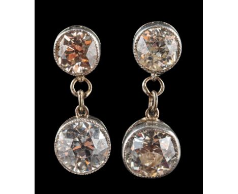 A pair of old-cut diamond, mille-grain-set, two-stone drop earrings,: estimated total diamond weight ca. 1.95cts, I-K colour,