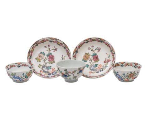 A pair of Chinese famille rose teabowls and saucers and a famille verte teabowl: of eggshell type, painted with chrysanthemum