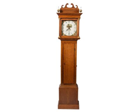 Pinn, Exmouth, an oak longcase clock: the thirty-hour duration movement striking the hours on a bell, the square eleven-inch 