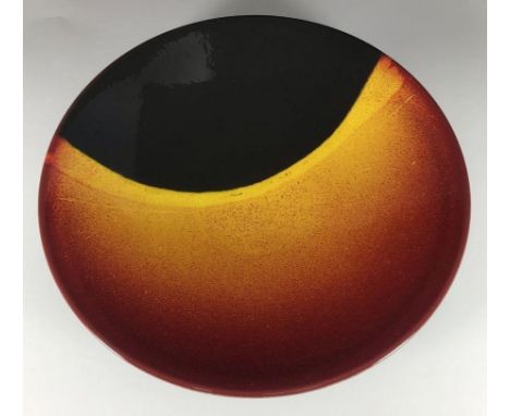 A Poole pottery plate from the 'Eclipse' Collection, limited edition number 564, in original box, with certification, 27cm di
