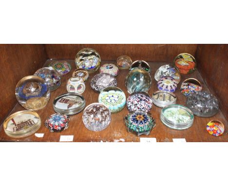 SECTION 34. A collection of 26 assorted glass paperweights including a Murano millefiori example, four flat pictorial example