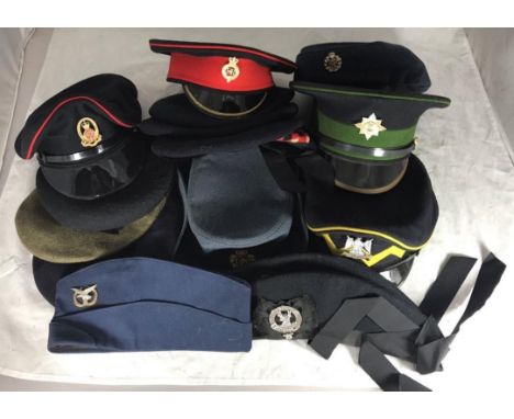 Fifteen various peaked caps / hats including Royal Scots Dragoon Guards, Queens Lancashire Regiment, RAF, Royal Tank Regiment