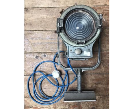 A vintage Mole Richardson type 406 solarspot studio lamp, raised on adjustable stand with base plate, 50cm tall including bas