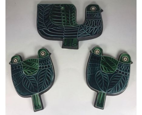 Three various Robert Jefferson for Poole Pottery wall plaques formed as stylised birds, each finished in blue and green glaze