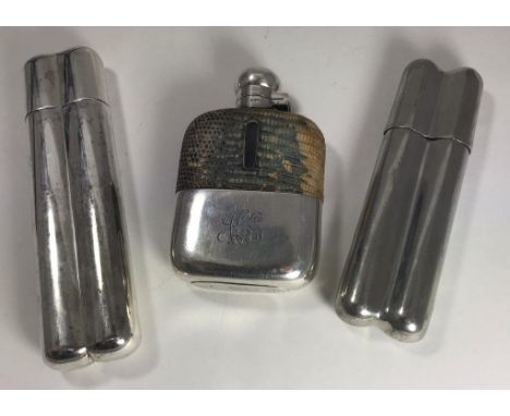 A silver-plated Dunhill combined cigar case and hip flask, together with another larger, unmarked example and a glass hip fla