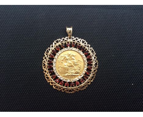 A Geo. V gold Sovereign, 1918, Sydney MM, in 9ct gold circular necklace pendant set with 24x round faceted garnets, total ite