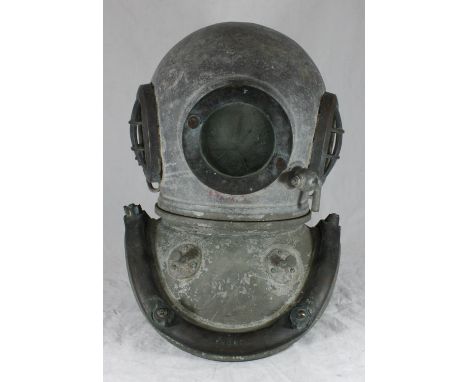 A 6-BOLT COPPER AND BRASS DIVING HELMET BY SIEBE GORMAN &amp; CO LTD, tinned overall, the top and bottom sections both inscri