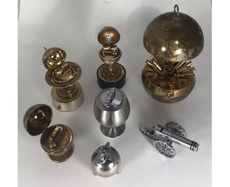 Six assorted novelty table lighters including two Ronson examples, one modelled as a goblet, three further lighters modelled 