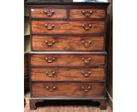 A George III mahogany chest on chest, the top section with two short, over two long graduated drawers and the base section wi