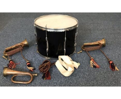 A Premier everplay marching drum with harness and key in soft carry case, together with two early 20th century military bugle