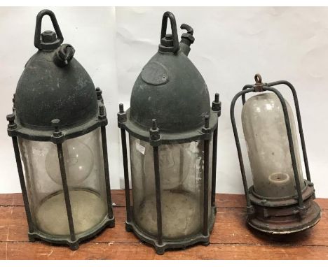 A pair of submarine flood lamps by Siebe Gorman &amp; Co Ltd, London, the domed cover with swivel suspension and power inlet 