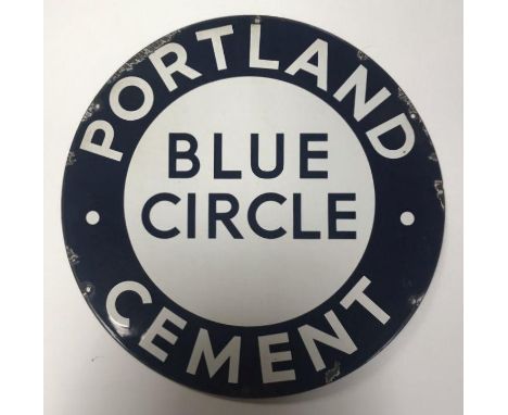 A circular blue and white enamel advertising sign for 'Portland Cement Blue Circle', approx. 38cm diameter 