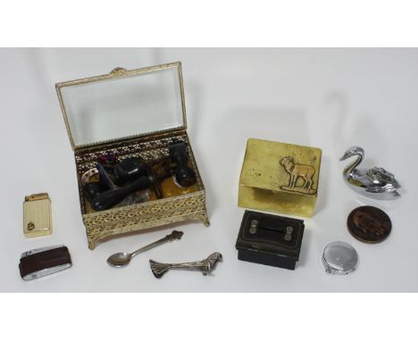 An assortment of mixed collectables comprising trinket boxes, various lighters including a Ronson example, a Rolex Bucherer L