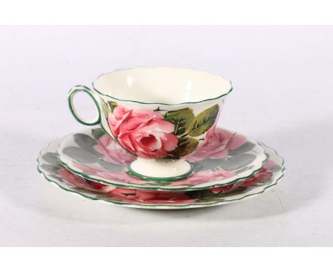 Wemyss Scottish pottery trio comprising tea cup and saucer and plate, each decorated in the cabbage rose pattern, painted mar