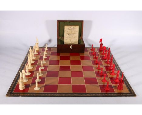 19th century ivory chess set of Calvert style, part stained red, the king 97mm, contained within a green baize lined box stam