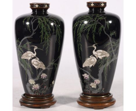 Pair of silver wired cloisonne vases of high shouldered form, the black enamelled bodies decorated with cranes in willow tree