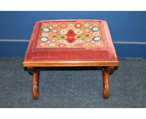 Antique X frame footstool, the rectangular top covered with tapestry panel, 55cm long.&nbsp; 