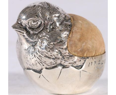 Edwardian sterling silver pin cushion in the form of a chick emerging from an egg, Samson Modau &amp; Co., Chester, 1909, 4cm
