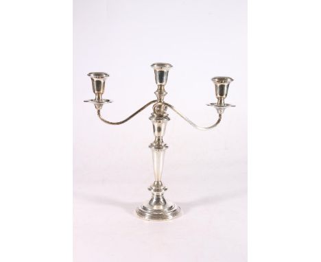 Sterling silver three light candelabra on plain tapering column, stamped base Empire sterling weighted 368, gross 1051g, 32cm