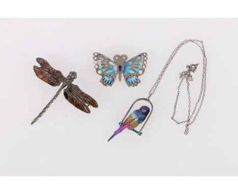 Silver enamelled butterfly brooch, maker Norman Grant and a silver parrot pendant on chain, maker Norman Grant and a silver e
