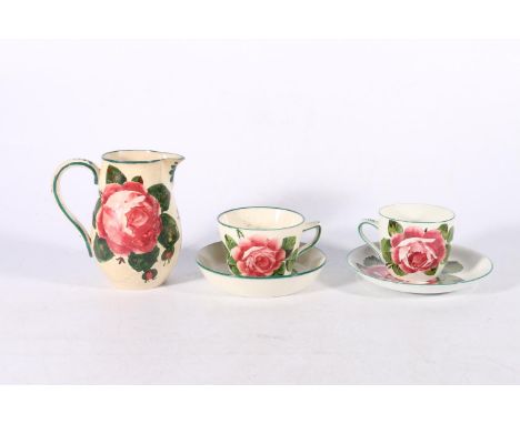 Wemyss Scottish pottery tea cup and saucer decorated in the cabbage rose pattern, painted mark 'WEMYSS' to base, another tea 