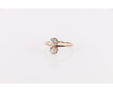 Unhallmarked gold two stone diamond ring, 2.2g. 