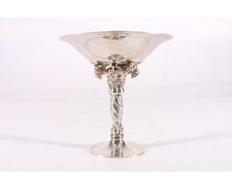 Danish silver pedestal fruit dish by Georg Jensen, the circular bowl supported on a tapering column with applied bunches of g