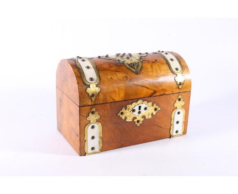 Victorian walnut dome topped tea caddy with brass mounted and sheet ivory panels, the hinged top opening to reveal a pair of 