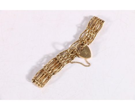 9ct yellow gold five bar gate link bracelet with heart closure, stamped LC, 13.4g. 