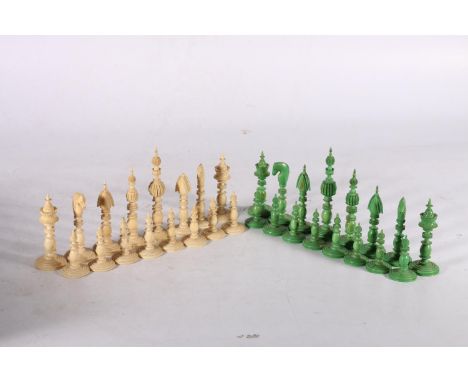 A mid 19th century Indian ivory Pepys style chess set, part stained green, complete and nicely carved, the king 11.5cm, proba