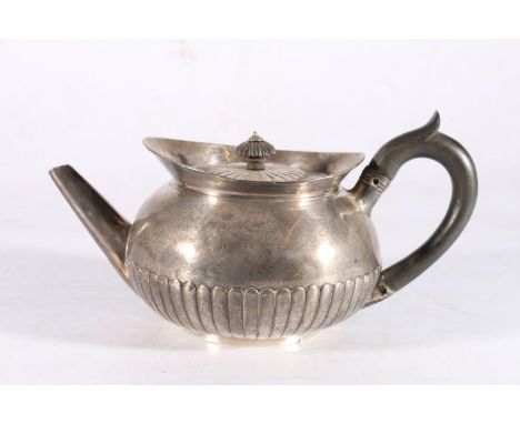 George III sterling silver teapot with fluted body, no makers mark, London, 1801, 14cm tall, 596g. 