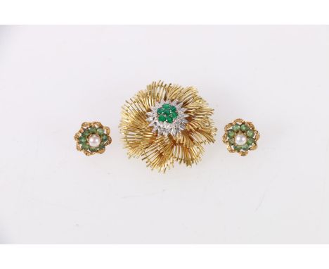 18ct yellow gold emerald set flowerhead brooch, 13.2g, and a pair of emerald and pearl set earrings, 3.4g. 