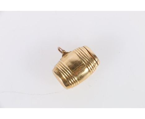 Unhallmarked yellow metal snuff box of barrel form, 12g. 