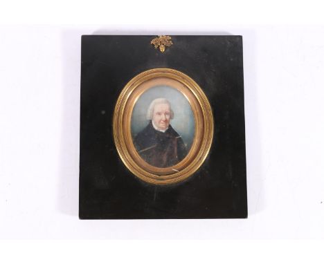 Antique portrait miniature on ivory of an elderly gentleman wearing a black jacket, 7cm x 5.5cm, frame size 16cm x 14.5cm. 