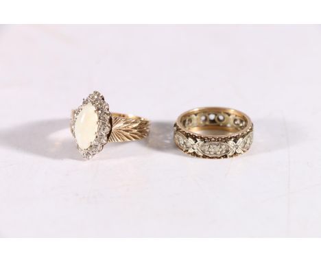 9ct gold opal and diamond ladies dress ring, size Q, 3.8g and a 9ct gold CZ set eternity ring, size M, 4.1g. 