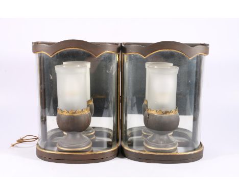 A pair of electric wall lanterns, probably by Colefax and Fowler, of demi lune shape with curved glass fronts holding egg cup