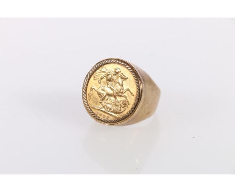 Sovereign ring set in 9ct gold band, the sovereign dated 1908, size R , 17.7g gross. 