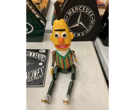 A VINTAGE STYLE WOODEN BERT SHELF PUPPET 