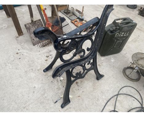 A PAIR OF CAST IRON BENCH ENDS 