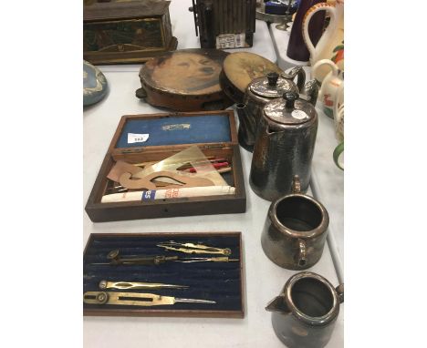 A PEWTER TEA SET, VINTAGE TAMBOURINES AND BOXED COMPASS ETC 