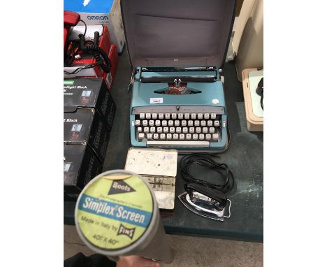 A BROTHER DELUX TYPEWRITER AND BOOTS SIMPLEX SCREEN AND TRAVEL IRON 