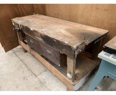 A WOODEN WORK BENCH WITH A RECORD No 52 VICE 