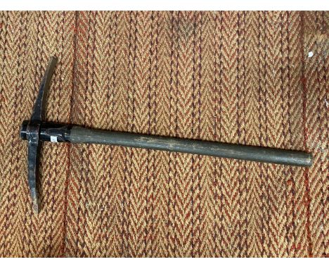 A MILITARY PICK AXE 