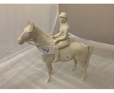 A BESWICK HUNTSWOMAN ON A GREY HORSE 