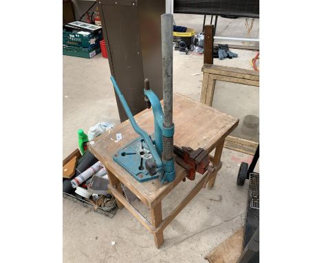 A SMALL WORK BENCH WITH PILLAR DRILL AND A VICE 
