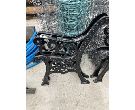 A PAIR OF CAST IRON BENCH ENDS 