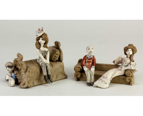 † HILARY BROCK (born 1933); a porcelain figure of a women in Edwardian costume seated on a bed under which lies a burglar, pa