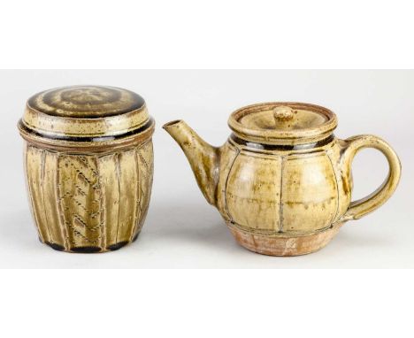 † MIKE DODD (born 1943); a lobed stoneware teapot covered in green ash and granite glaze, impressed MJD mark, height 13cm, an