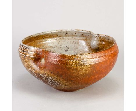 † LISA HAMMOND (born 1956) for Maze Hill Pottery; a stoneware bowl with pinched rim covered in soda shino glaze, impressed LH